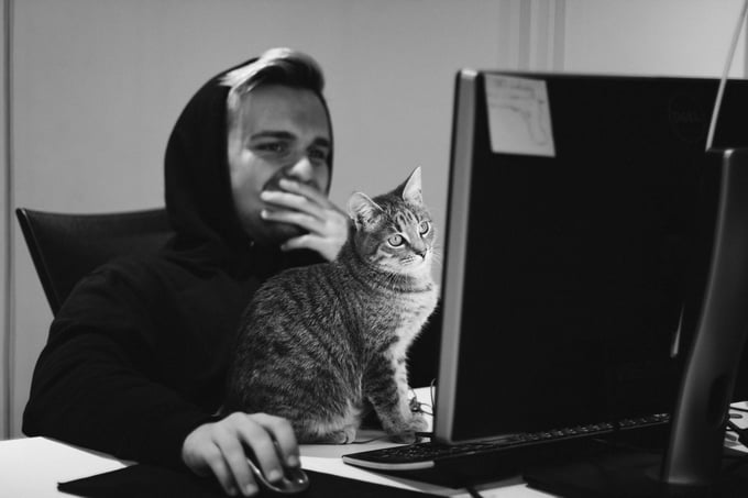 Man and cat ponder Azured's A-Z of Microsoft cloud security